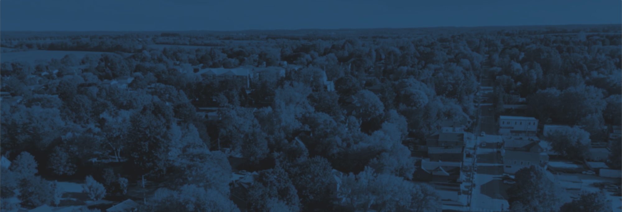 Aerial view over Mount Albert at dusk
